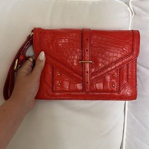 Tory Burch Medium Sized Clutch in Dark Orange Crocodile Effect